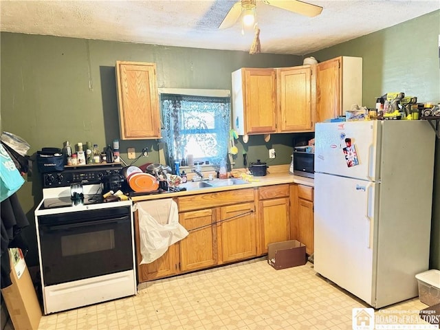 kitchen with white refrigerator, ceiling fan, electric stove, and a textured ceiling