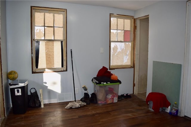 miscellaneous room with dark hardwood / wood-style floors