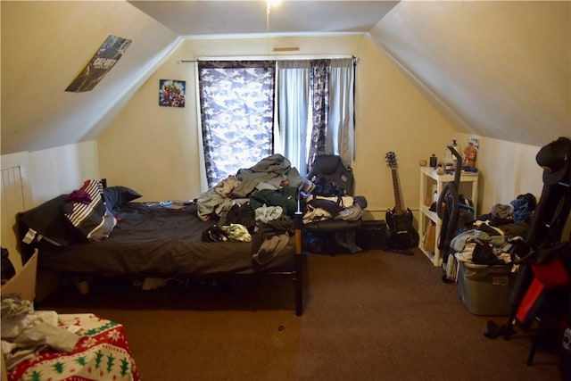 carpeted bedroom featuring vaulted ceiling