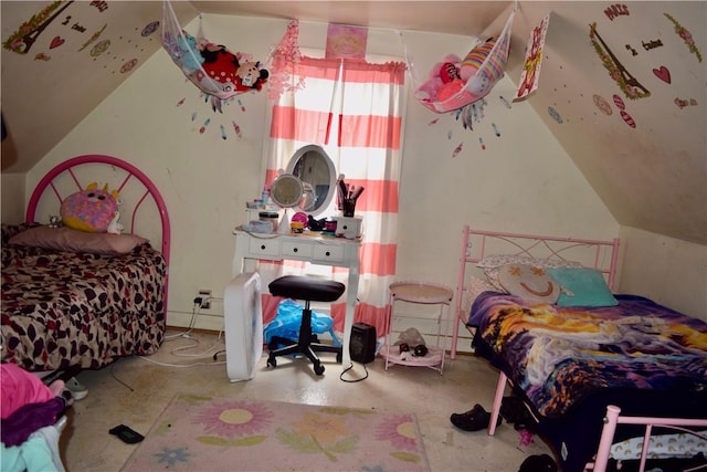 bedroom featuring lofted ceiling