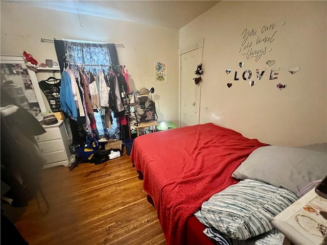 bedroom featuring hardwood / wood-style flooring