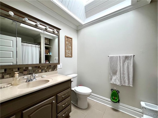 bathroom featuring tasteful backsplash, ornamental molding, tile patterned flooring, and vanity