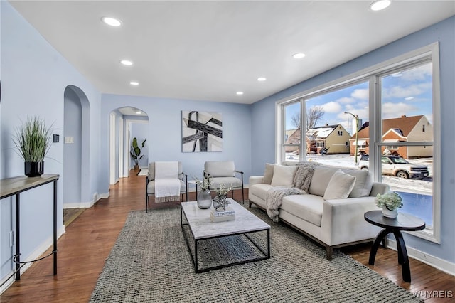 living room with dark wood-type flooring