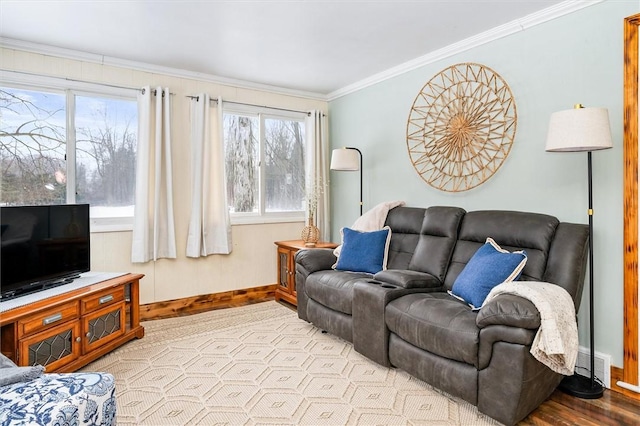 living room featuring crown molding and light wood-type flooring