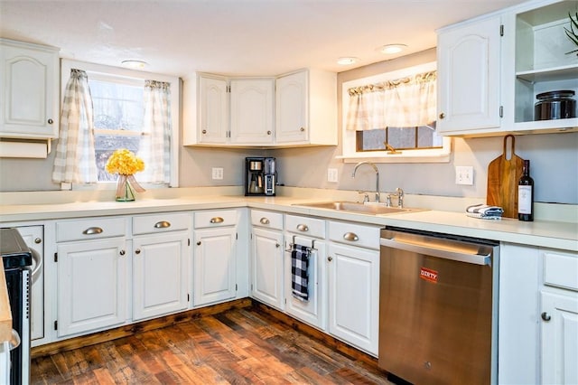 kitchen with white cabinetry, sink, dark hardwood / wood-style flooring, and stainless steel appliances