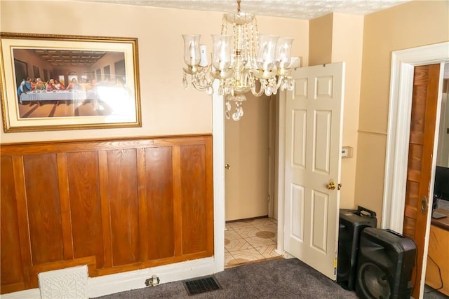 interior space with an inviting chandelier