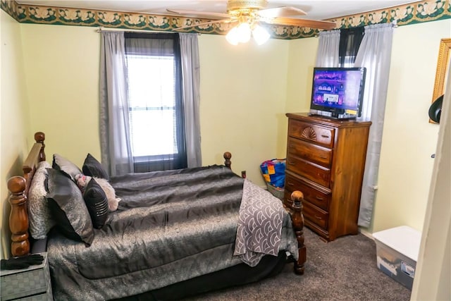 bedroom featuring ceiling fan and carpet flooring