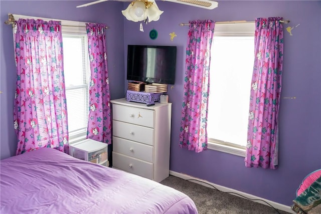 bedroom with ceiling fan and carpet flooring