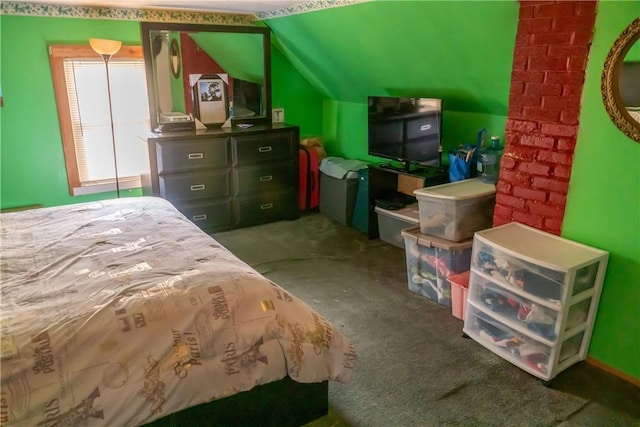 bedroom featuring vaulted ceiling