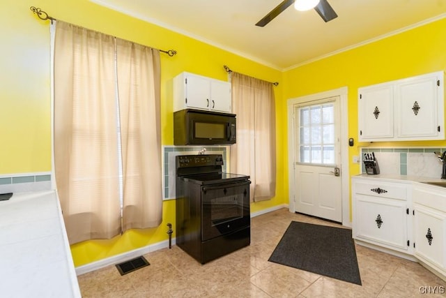 kitchen with backsplash, white cabinets, ornamental molding, and black appliances