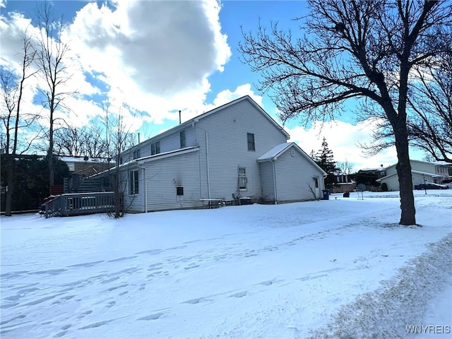 view of snow covered property