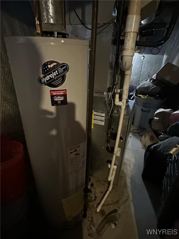 utility room with water heater