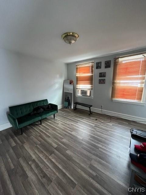 sitting room featuring dark hardwood / wood-style floors