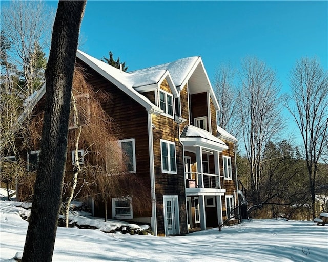 view of snow covered property