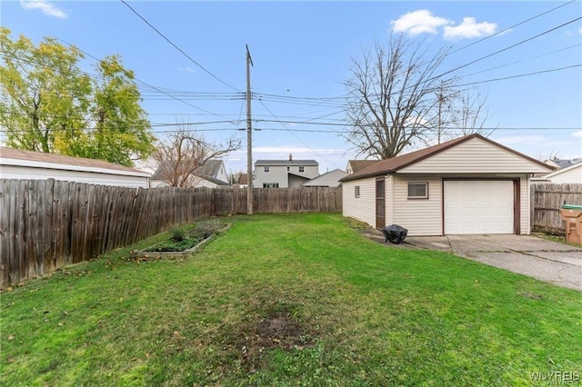 view of yard featuring an outbuilding and a garage