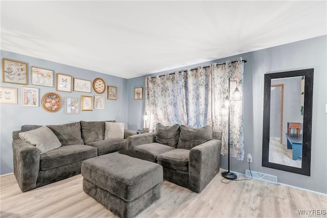 living room with hardwood / wood-style floors