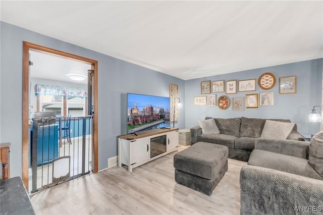 living room featuring light hardwood / wood-style flooring