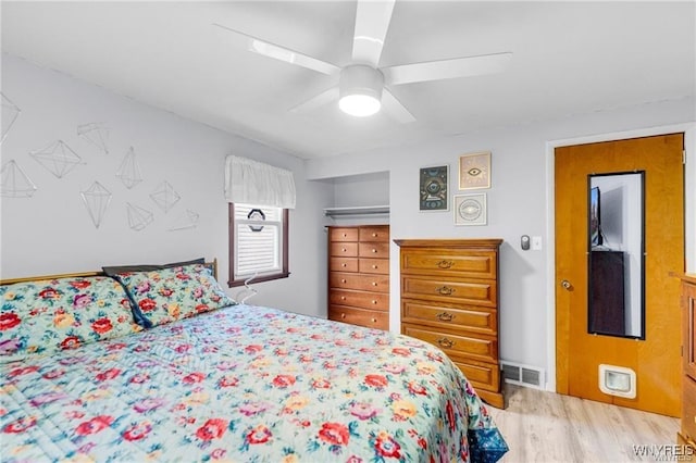 bedroom featuring ceiling fan and light wood-type flooring