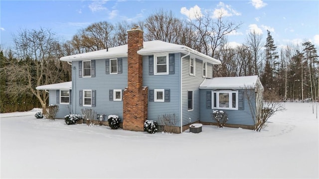 view of snow covered property