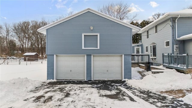 view of snow covered garage