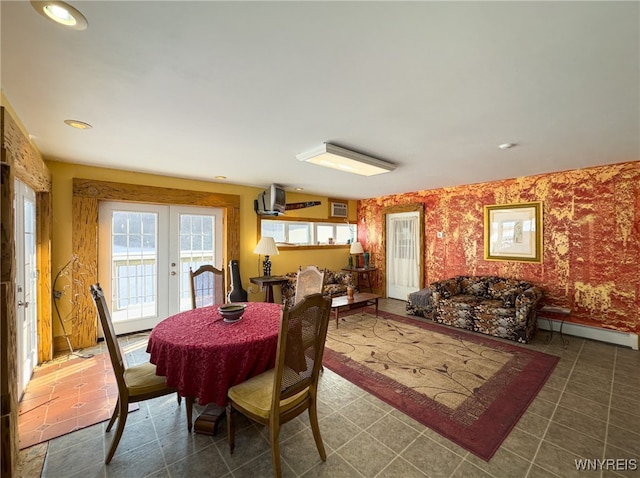 dining space with french doors and a baseboard radiator