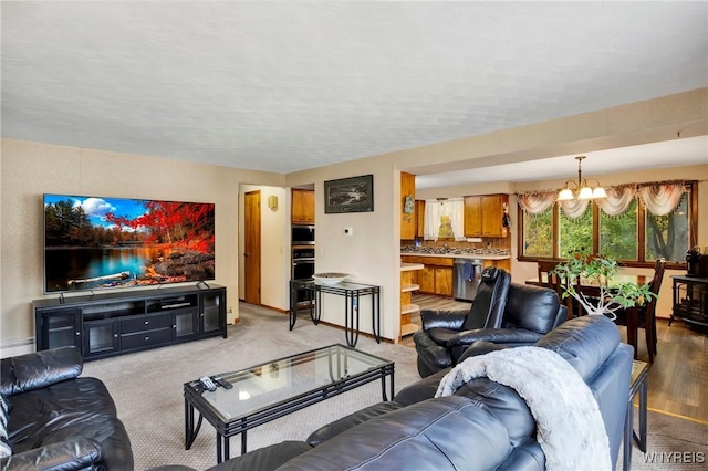 living room with an inviting chandelier