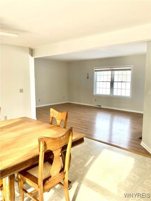 dining room with hardwood / wood-style floors