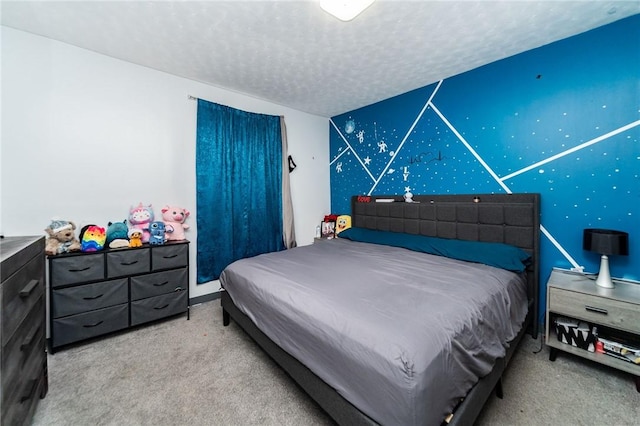 carpeted bedroom featuring a textured ceiling