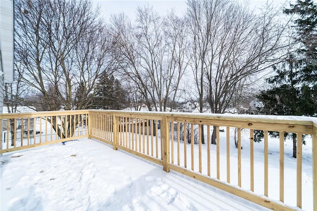 view of snow covered deck