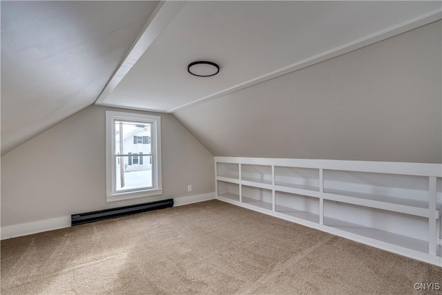 bonus room featuring carpet, lofted ceiling, baseboard heating, and built in shelves