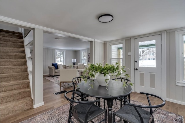 dining space featuring hardwood / wood-style flooring