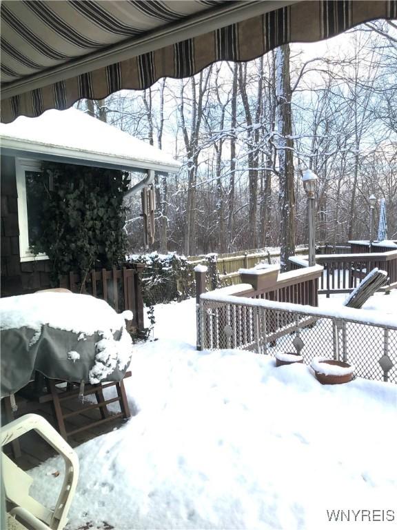 view of yard covered in snow