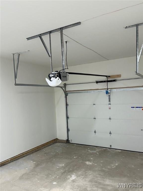 garage featuring a garage door opener