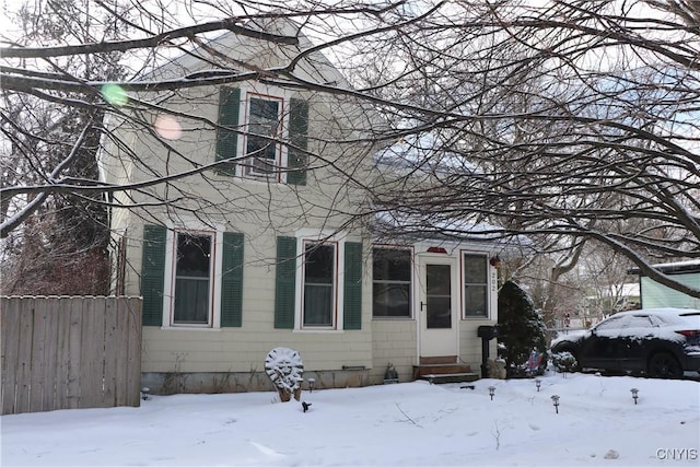 view of snow covered property