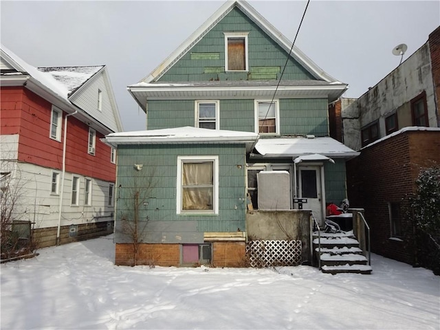 view of snow covered house