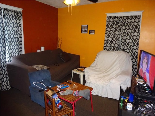 living room featuring ceiling fan