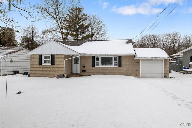 single story home featuring a garage