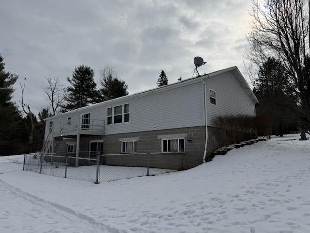 view of snow covered property