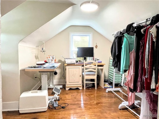 office area with lofted ceiling and hardwood / wood-style floors