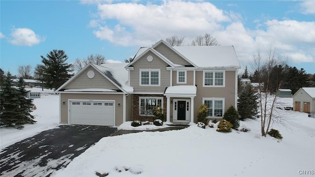 view of front of property with a garage