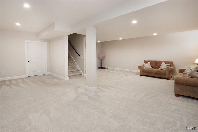 unfurnished living room with light carpet