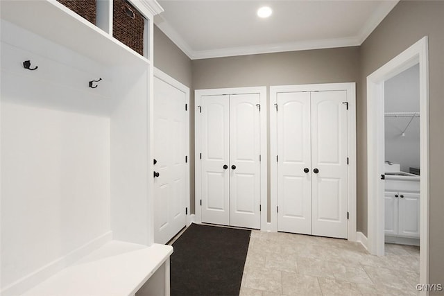 mudroom with ornamental molding