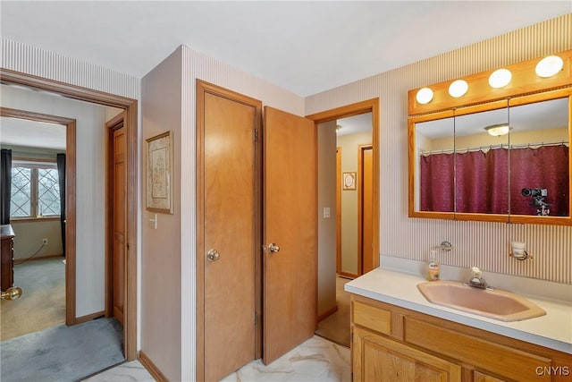 bathroom with vanity and a shower with curtain