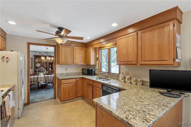 kitchen with black dishwasher, sink, range, light stone counters, and kitchen peninsula