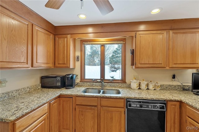 kitchen with dishwasher, light stone countertops, sink, and ceiling fan