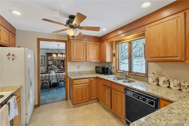 kitchen with ceiling fan with notable chandelier, dishwasher, sink, electric range, and light stone countertops