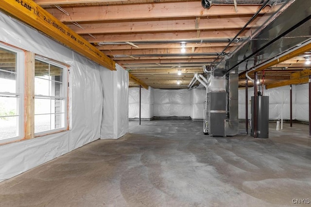 basement with heating unit and gas water heater