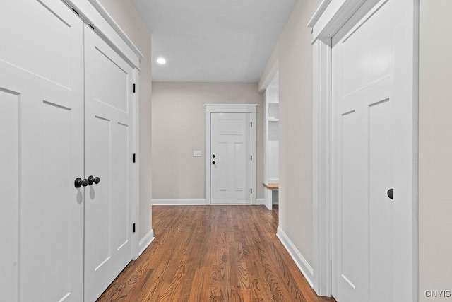 hall featuring wood-type flooring