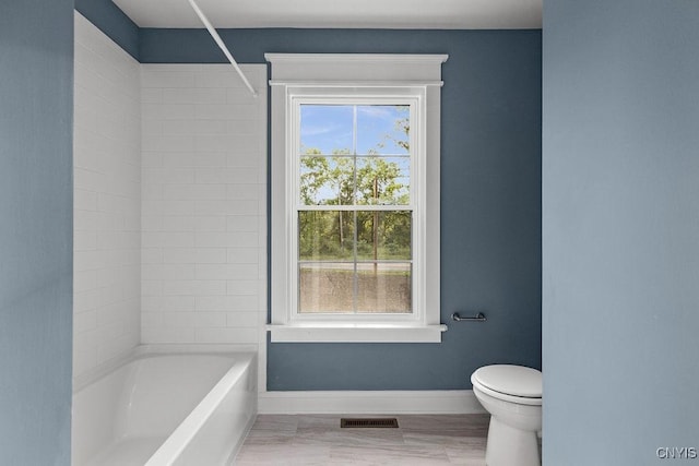 bathroom with  shower combination and toilet