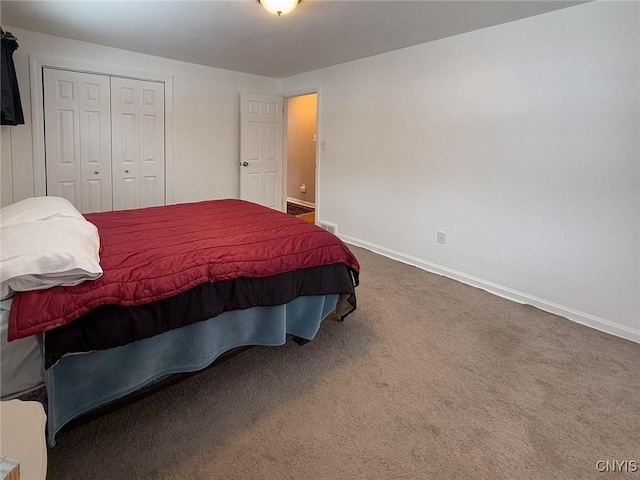 carpeted bedroom with a closet